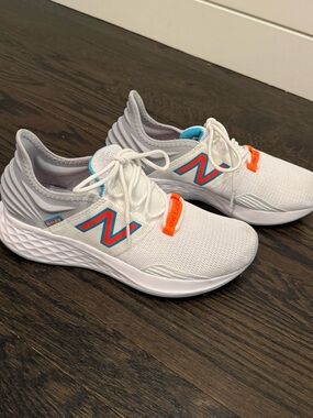 New Balance White Sneakers with Blue & Orange Accents